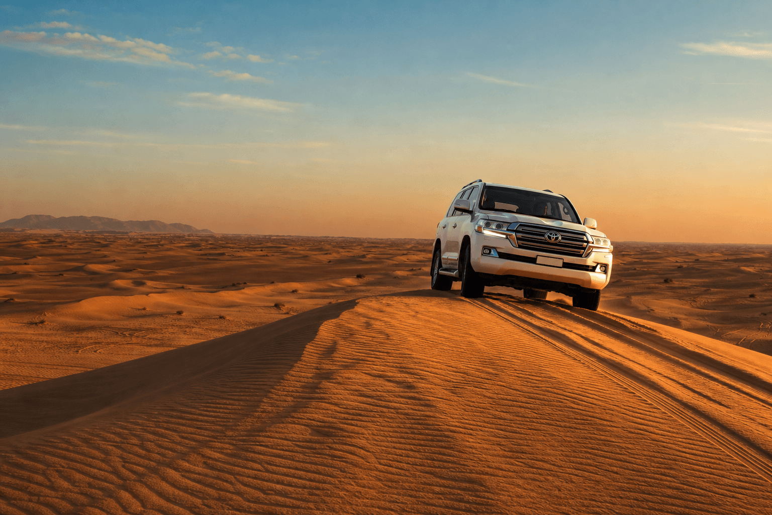 4x4 SUV on Dubai desert dunes for safari transport